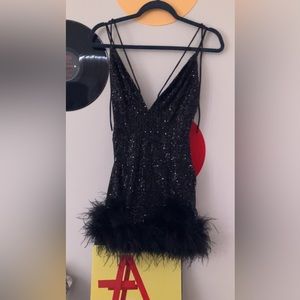 sparkly black homecoming dress with feather